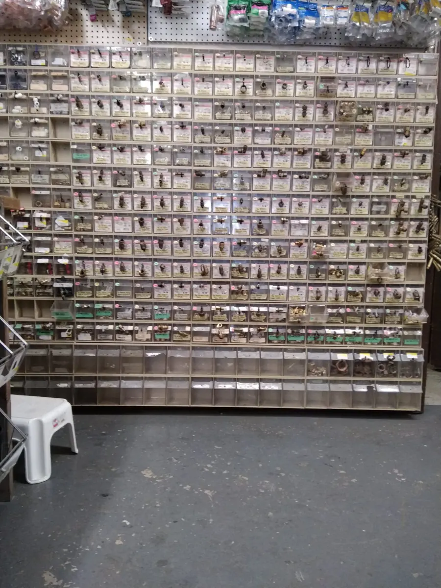 The brass wall: bins of brass fittings