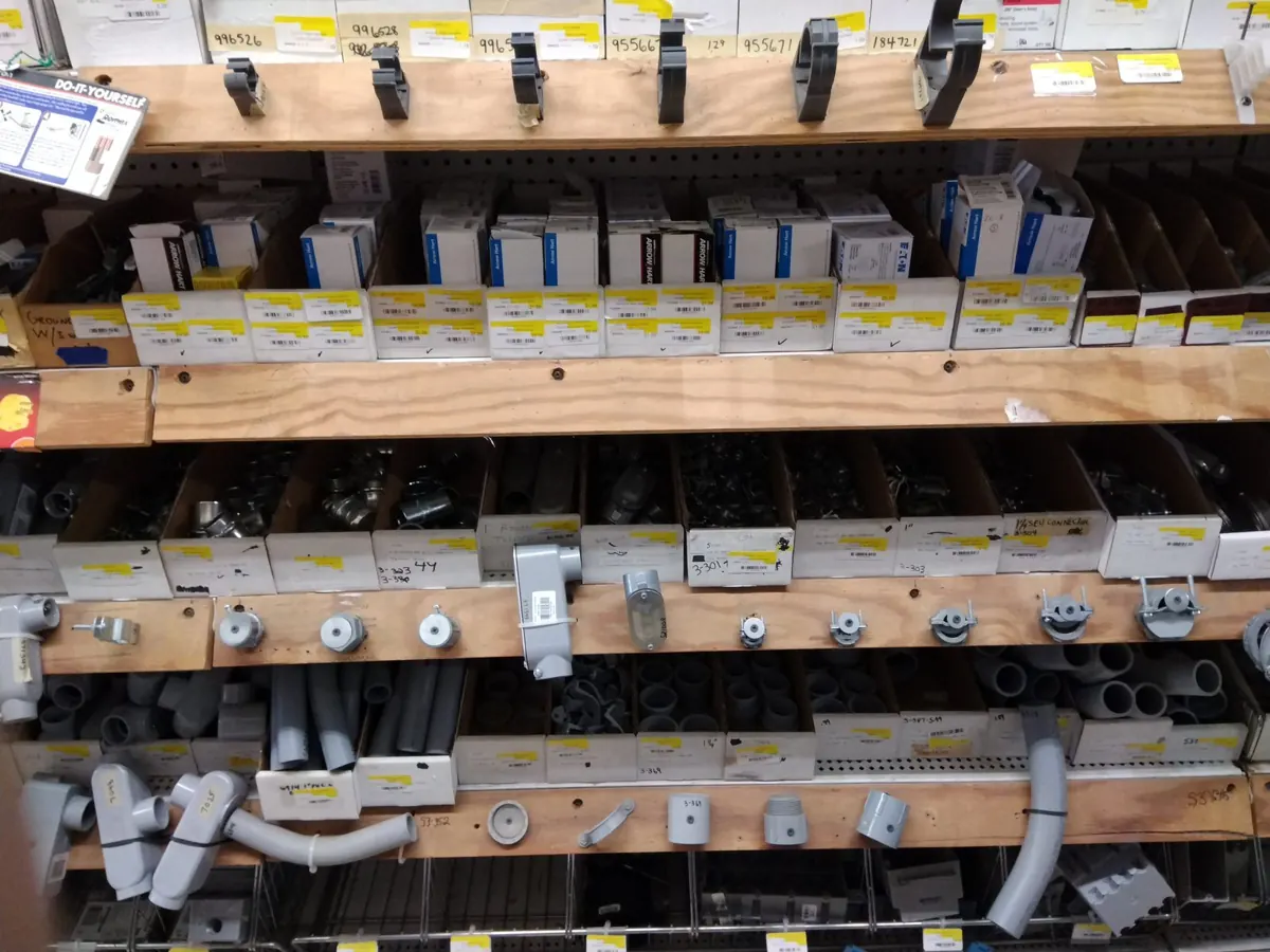 Wooden bins of electrical fittings