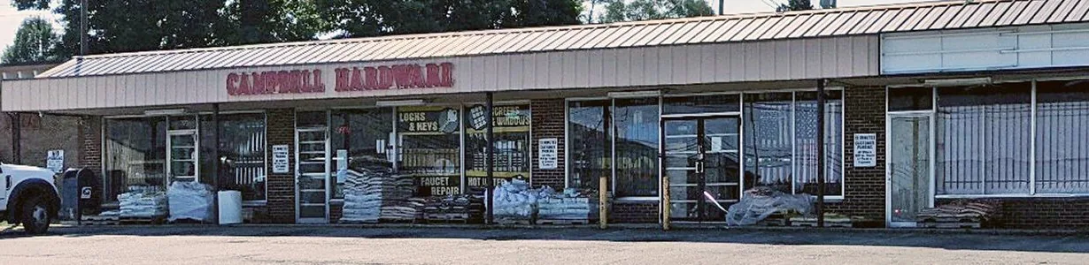 The Campbell Hardware storefront on McCartney Road with its red sign